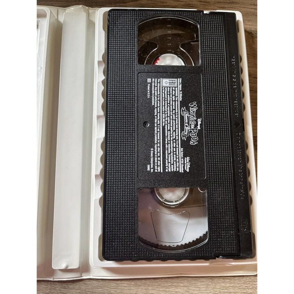 Disney's "WINNIE THE POOH: SEASONS OF GIVING" VHS in White Clamshell Case - Picture 2 of 3